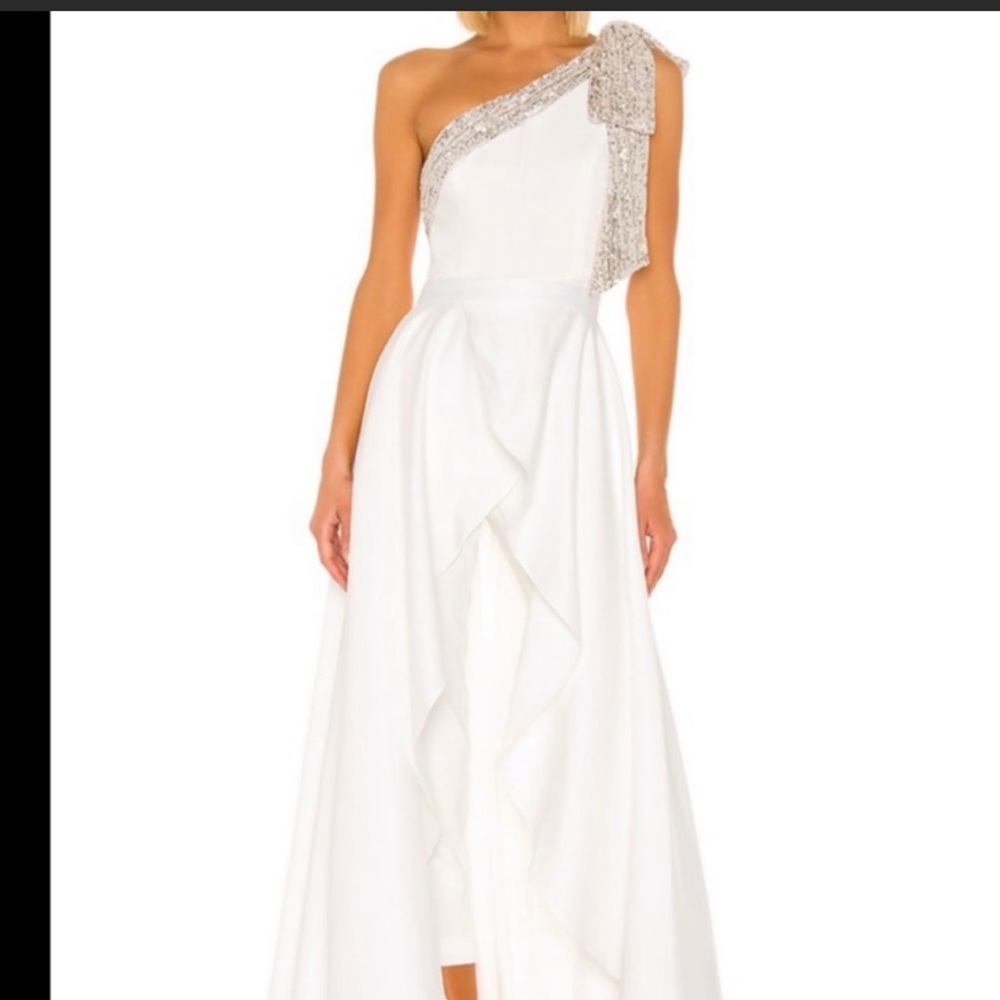 New with tags Jay Godfrey Asymmetrical Sequin Jumpsuit with detachable skirt.
